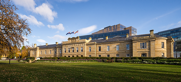 Image of two-storey sandstone building